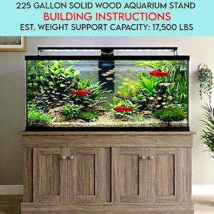May include: A 852-litre aquarium with live plants and red fish sits on a solid wood stand. The stand has a light brown finish and cabinet doors. The text on the image reads: "225 GALLON SOLID WOOD AQUARIUM STAND BUILDING INSTRUCTIONS EST. WEIGHT SUPPORT CAPACITY: 17,500 LBS."