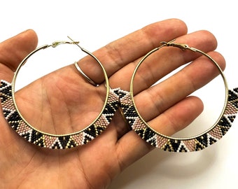 small hoops with braided Glass pearls