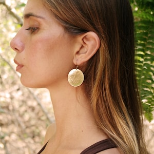 round earrings from hammered brass image 3