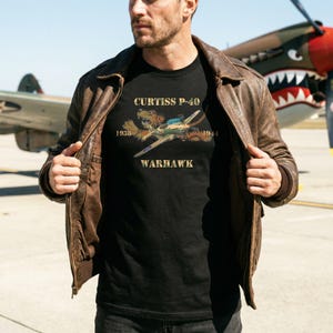 May include: A set of three ceramic mugs with a speckled, matte finish. The mugs are in shades of cream, light gray, and dark gray. Each mug has a simple, minimalist design, perfect for coffee or tea.