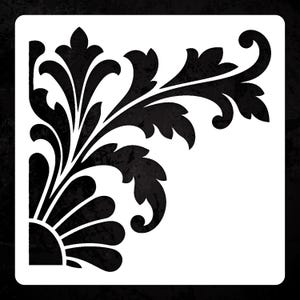 May include: A square stencil featuring a black, symmetrical corner design with intricate, curved acanthus leaf patterns and a fan-shaped base element. The design is set against a solid white background, creating a high-contrast graphic template.