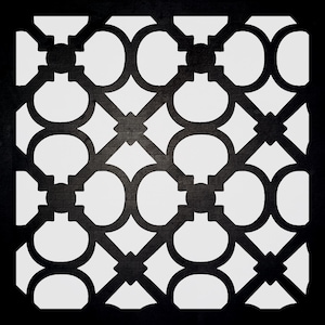 May include: A repeating geometric pattern in white against a dark gray brick background. The design features a series of interconnected shapes, including circles, diamonds, and crosses, creating a symmetrical and visually appealing composition. The contrast between the white shapes and the dark background enhances the pattern's prominence.