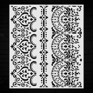 May include: A white stencil featuring three decorative border designs in black. The designs include ornate floral and scroll patterns, with symmetrical arrangements and repeating motifs. The stencil is ideal for craft projects.