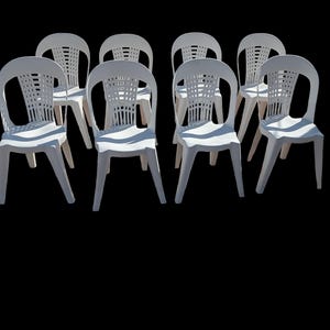 May include: A handmade wooden sign with the text "Welcome to our home" in a handwritten style. The sign is painted white with black lettering and a distressed finish, perfect for home decor.