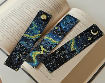 May include: Four rectangular bookmarks with a starry night design, featuring swirling blues, yellows, and black. The bookmarks are placed on an open book, showcasing a classic art theme.