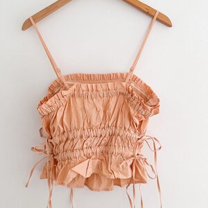 Free People Gabby Tube Top Peach Ruched Tie Sides Peplum Hem Removable Straps Size Large image 8