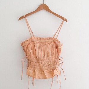 Free People Gabby Tube Top Peach Ruched Tie Sides Peplum Hem Removable Straps Size Large image 9