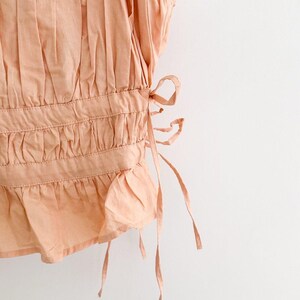 Free People Gabby Tube Top Peach Ruched Tie Sides Peplum Hem Removable Straps Size Large image 3