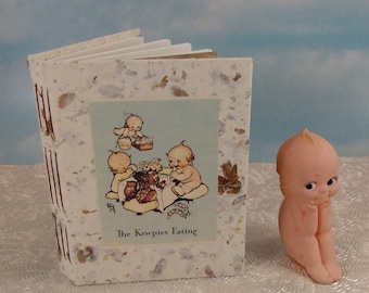 Kewpie Doll Baby Memory Book Small Baby Shower Album with Natural Mulberry Cover of The Kewpies Eating