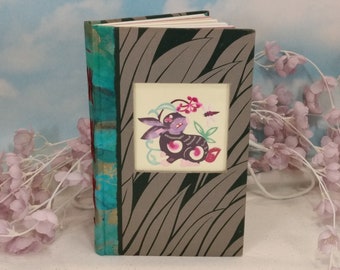 Rabbit Garden Blank Writing Journal with Colorful Chinese Papercut Inset in Vintage Hardcover with All Over Leafy Pattern in Green