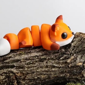 Figura flexible de zorro bebé Snuggliez | Mini animal articulado para jugar y coleccionar | Diseño CozyLabs