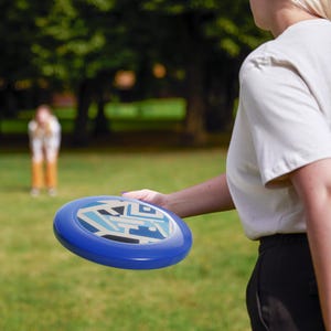 Wham-O Frisbee, Fun Outdoor Game, Summer Party Accessory, Kids & Adults, Unique Gift for All Occasions