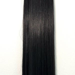 May include: A bundle of long, straight, black hair extensions. The hair is a solid, dark color and appears smooth and shiny. The strands are neatly aligned, suggesting a high-quality product for styling or adding length.