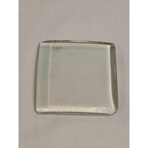 May include: A clear, rectangular glass tray with rounded corners. The tray has a minimalist design and is suitable for serving or display. The LSA brand is visible on the side of the tray.