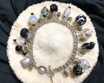 Handmade Black and White Glass Bead Charm Bracelet with Sterling and Silvery Pearl Clasp.