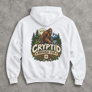 Youth Cryptid Research Club Hoodie, Bigfoot Sasquatch Wilderness Print, Outdoor Adventure Gift