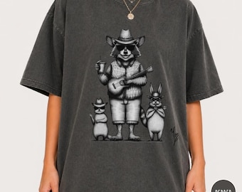 Tvättbjörn Cowboy Band Komfortfärger T-shirt Western Folkkonst Djurtrio Gitarr Country Vibe T-shirt