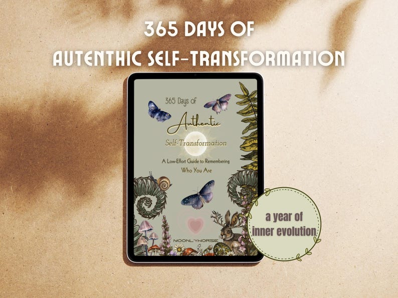 May include: A digital tablet displays the text "365 Days of Authentic Self-Transformation." The cover art features butterflies, a snail, mushrooms, and a rabbit. The text "a year of inner evolution" is also present.