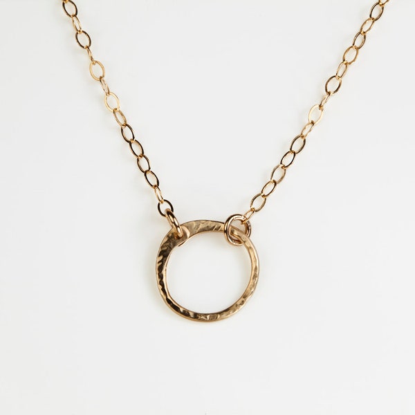 Minimalist Zen Circle Necklace- Hammered Gold. Rustic & delicate, this hand forged simple circle is the perfect everyday necklace.