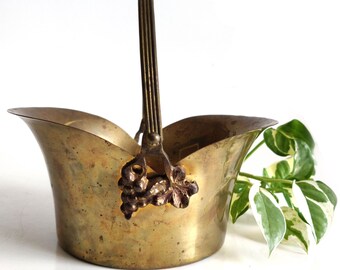 Vintage solid brass basket with handle