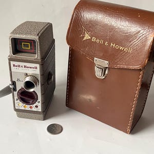 Vintage Bell & Howell 8mm Film Camera: 1950s Wind-Up w/ Case