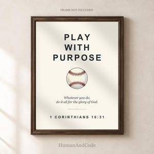 May include: A wall art print featuring the text PLAY WITH PURPOSE in bold black letters, a central illustration of a baseball with red stitching, and the scripture text Whatever you do, do it all for the glory of God. 1 CORINTHIANS 10:31.