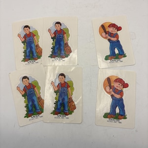 Adesivos vintage de 1985 dos bonecos Cabbage Patch Kids, brinde de cereal, Xavier Otis Lee