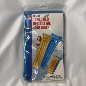 May include: A package of colored reflective air mats measuring 72 inches by 27 inches. The packaging features the text Colored Reflective Air Mats and Warning Choking Hazard Small Parts. The product is shown in gold and blue colors.