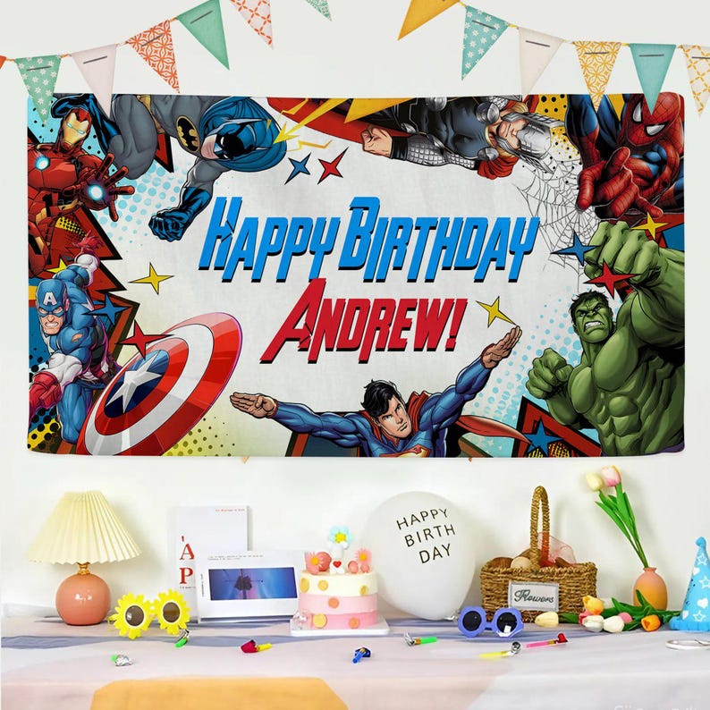 May include: A rectangular birthday banner featuring comic book superheroes including Iron Man, Batman, Thor, Spider-Man, Captain America, Superman, and Hulk. The text reads Happy Birthday Andrew in blue and red lettering against a comic book background.