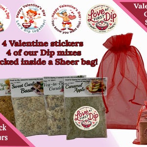 May include: A Valentine's Day gift set with four small bags of dip mix, a red sheer bag, and four Valentine's Day stickers. The dip mix flavors are Cheese-e-Hea Pepper Jack, Sweet Garlic Basil, Veg-ta-Be Garden, and Caramel Apple. The stickers say "Happy Valentine's Day Let's Dip Together!" and "Love at First Dip". You Pick 4 Flavors.