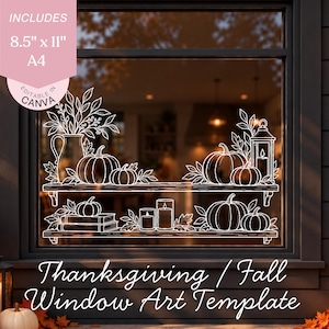 May include: A white line art window decal template featuring two shelves decorated with pumpkins, candles, a pitcher, and foliage. The design includes text stating INCLUDES 8.5" x 11" A4 and EDITABLE IN CANVA. The art is displayed on a window pane.