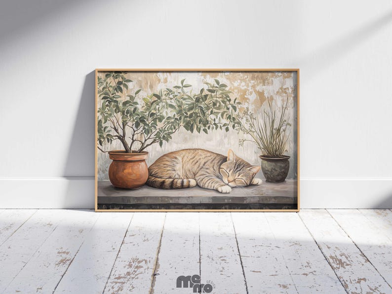 May include: A framed print featuring a sleeping tabby cat resting on a ledge. Two potted plants flank the cat, with a larger plant on the left and a smaller one on the right. The background has a textured, aged appearance.