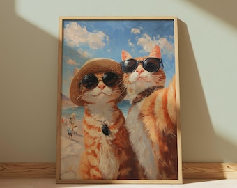 May include: Framed art print featuring two orange tabby cats taking a selfie at the beach. One cat wears a straw hat, the other sunglasses. The background shows a blue sky, ocean, and beachgoers.