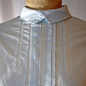 Vintage 1970s 80s Pale Blue Cotton High Neck Victorian Style Blouse With Inset White Lace and Pin Tucks 36 Inch Bust