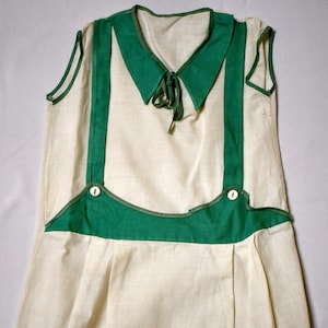 Vintage 1920s Off White Cotton Muslin Child's Sleeveless Shift Dress With Green Applique Collar Suspenders and Trim Sz 6/7