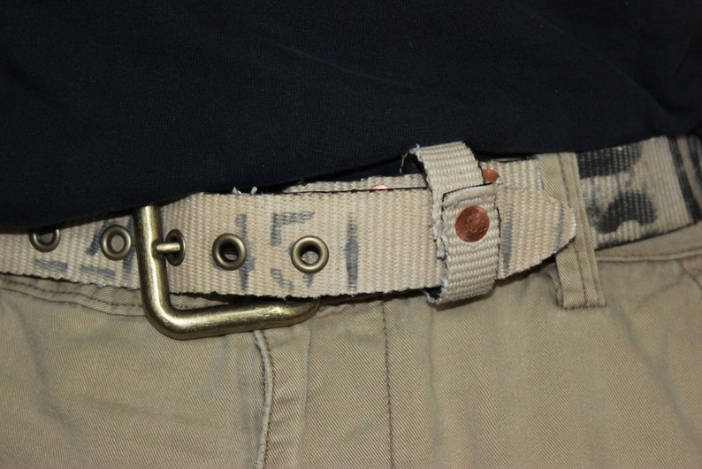 Belt 32 constructed from Reclaimed fire hose Featuring copper and antique brass