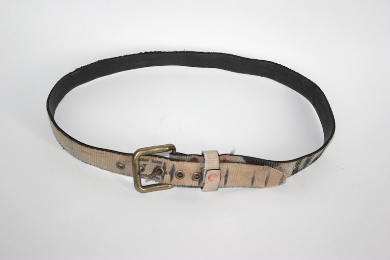 Belt 32 constructed from Reclaimed fire hose Featuring copper and antique brass