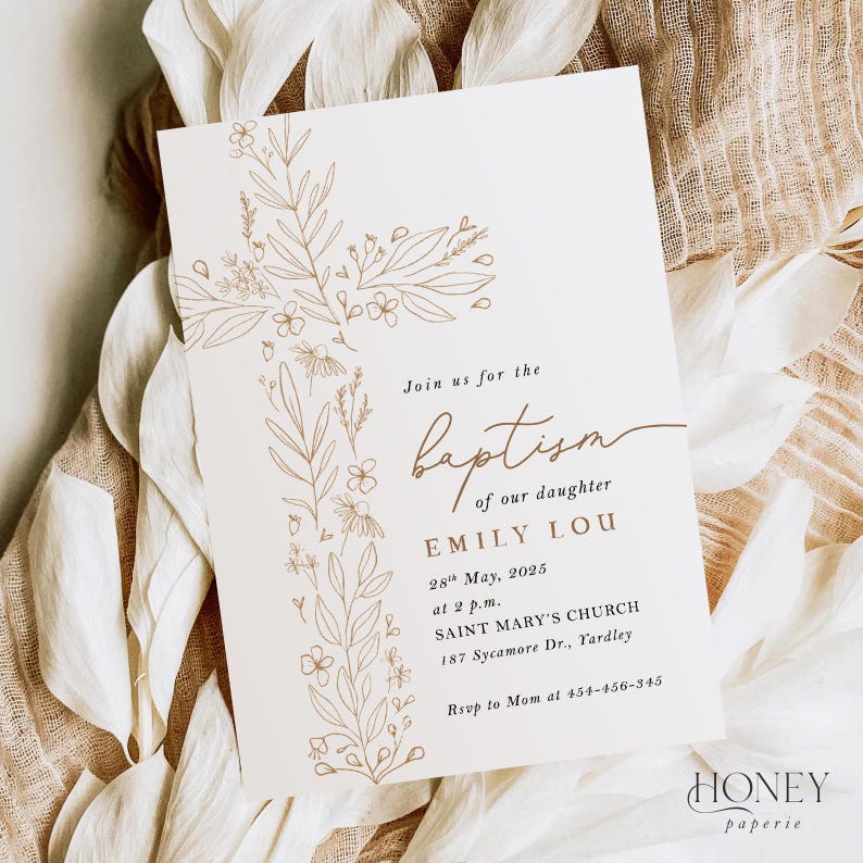May include: Cream baptism invitation with a floral cross design. The text reads "Join us for the baptism of our daughter Emily Lou" with event details. The invitation is from Honey Paperie.