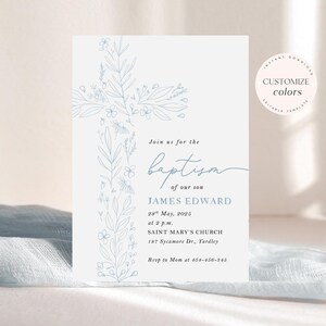 May include: A baptism invitation featuring a light blue floral cross design. The invitation includes the text "Join us for the baptism of our son James Edward" and event details. A circular graphic reads "Customize Colors".