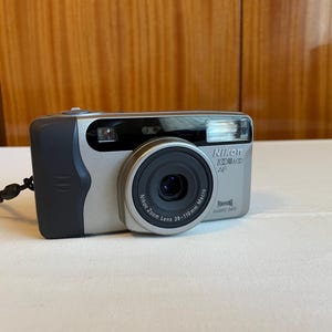 Nikon Zoom 600 AF – 35mm Point & Shoot Film Camera, Working, Lens Cover Not Closing