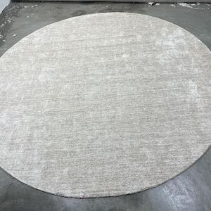 Handloom Bamboo Silk Rug: Round Ivory Area Rug - Minimalist Decor