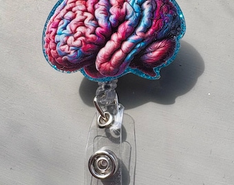 Carrete de insignias de cerebro colorido