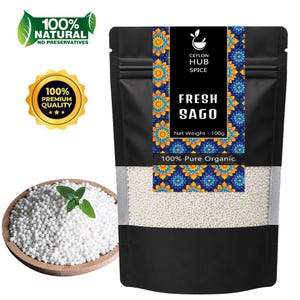 May include: A black pouch of fresh sago with a clear window, displaying small white pearls. The pouch has a label with the text "FRESH SAGO" and "100% Pure Organic." A wooden bowl of sago and mint leaves is in the image, along with a gold seal.