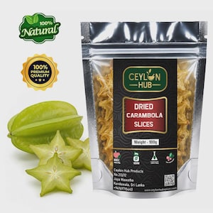 May include: A silver stand-up pouch containing 100g of dried carambola slices, labeled Ceylon Hub. The packaging features a black design with text, icons, and a QR code. Beside the pouch are one whole green star fruit and two star-shaped slices.