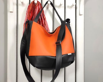 designer vegan leather hobo bag, unique orange tote, slouchy crossbody purse for women, shoulder handbag with zipper, perfect gift ideas