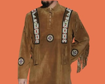 May include: Brown suede shirt with decorative beadwork and fringe. The shirt features detailed beadwork on the shoulders and sleeves, with a central circular design. The long-sleeved shirt has a lace-up neckline and fringe along the sleeves.