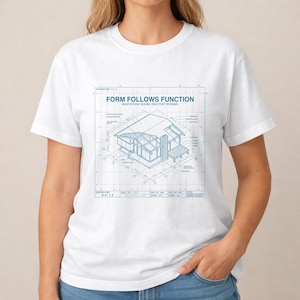May include: A white short-sleeve t-shirt featuring a blue architectural blueprint graphic on the chest. The print displays an isometric house drawing with the text "FORM FOLLOWS FUNCTION" and "ARCHITECTURAL SCHEMA: CASE STUDY RESIDENCE".