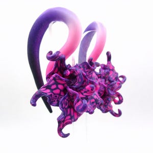 Meters voor tropische orchideebloem – neonroze en violette pluggen (maat 6G-1")