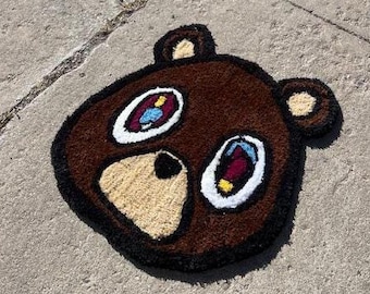 Tapete de urso de formatura de Kanye West