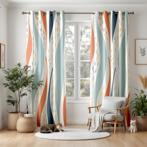 May include: A pair of patterned curtains with a modern design. The curtains feature vertical stripes in orange, blue, and light blue, with small yellow and blue dot accents. The curtains hang in front of a window, with a chair and plants in the room.